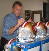Joe Montana Autographing Helmets for NSD