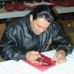 Roberto Duran signing for National Sports Distributors