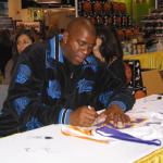 Magic Johnson autographing for National Sports Distributors