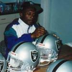 Oakland Raiders Tim Brown autographing for National Sports Distributors