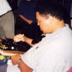 Muhammad Ali autographing bells for National Sports Distributors