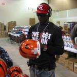 Chad Johnson autographing helmets for National Sports Distributors