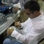 Howie Long signing helmets for National Sports Distributors