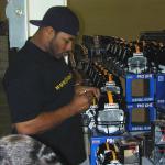 Jerome Bettis autographing helmets for National Sports Distributors