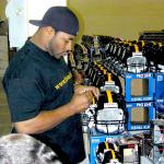 Jerome Bettis autographing helmets for National Sports Distributors