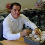 Pete Rose autographing baseballs for National Sports Distributors