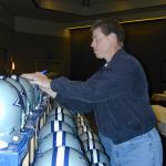 Troy Aikman autographs Dallas Cowboys helmets for National Sports Distributors