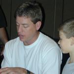 Troy Aikman and NSD Tyler Hemphill talk for hours at a National Sports Distributors private signing