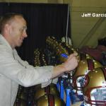 Jeff Garcia autographing helmets for National Sports Distributors