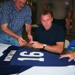 Joe Montana autographing Pro Bowl Jerseys for National Sports Distributors