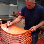 Joe Montana autographing Candlestick Park Seats for NSD