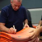 Joe Montana signing exclusive #16 Candlestick Park seatbacks with NSD