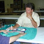 Dan Marino autographing jerseys for National Sports Distributors