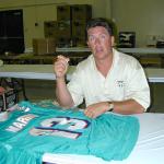 Dan Marino autographing jerseys for National Sports Distributors