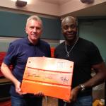 Joe Montana and Jerry Rice with NSD Candlestick Park seatbacks