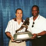 Billy Sims show Rob Hemphill his Heisman Trophy