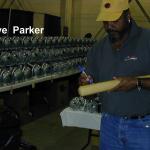 Dave Parker autographing bats for National Sports Distributors