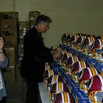 John Riggins autographing hemets for National Sports Distributors