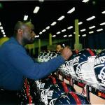 Lawrence Taylor signing helmets for NSD