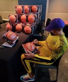 Walt Frazier Signing NSD Basketballs